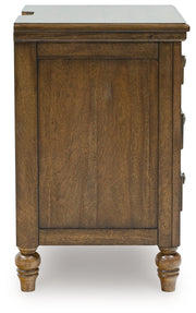 Sturlayne King Upholstered Panel Bed with Mirrored Dresser, Chest and 2 Nightstands in Brown from Ashley - Luna Furniture