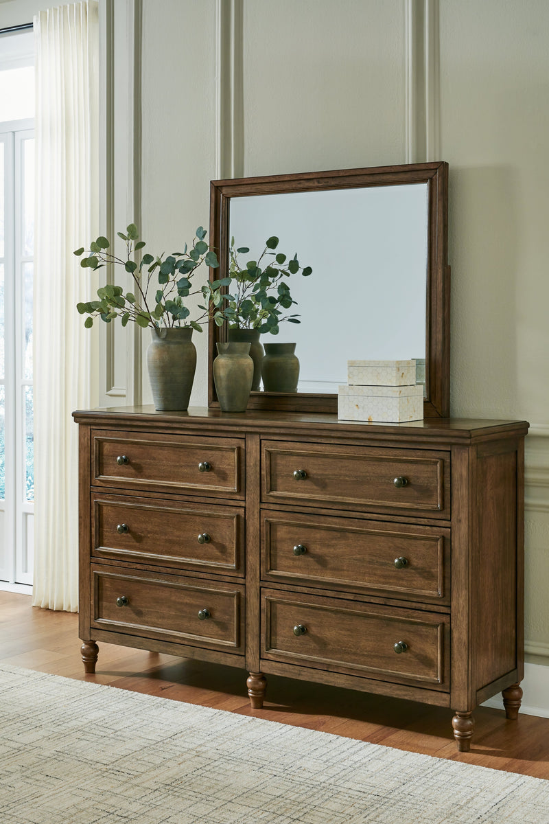 Sturlayne King Upholstered Panel Bed with Mirrored Dresser in Brown from Ashley - Luna Furniture