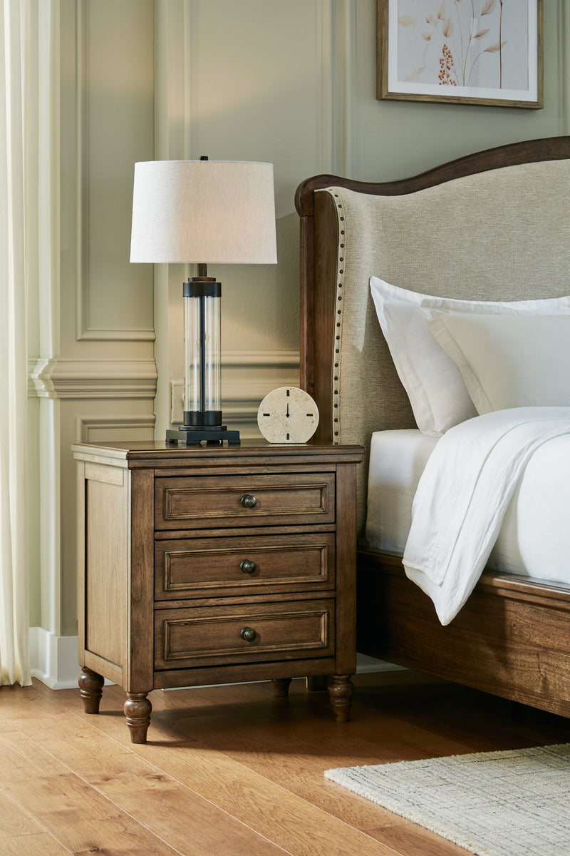 Sturlayne Queen Upholstered Panel Bed with Mirrored Dresser and Nightstand in Brown from Ashley - Luna Furniture