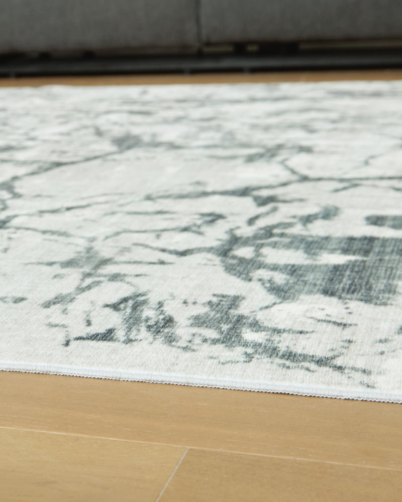 Tobinbury Gray Washable 5' x 7' Area Rug - R407422