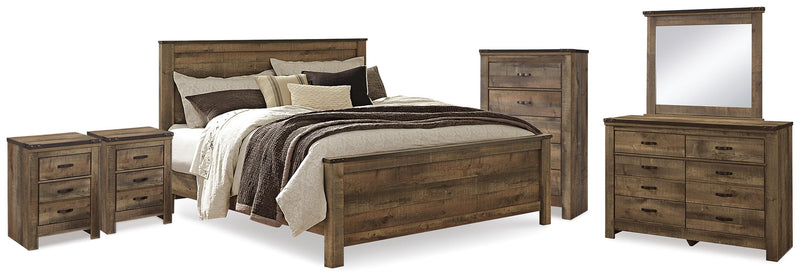 Trinell Brown King Panel Bed. Dresser, Mirror, Chest and 2 Nightstands - B446B97