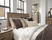 Trinell Brown Queen Panel Headboard, Dresser, Mirror, Chest and Nightstand - B446B90