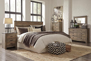 Trinell King/California King Panel Headboard Bed with Mirrored Dresser and Chest in Brown - PKG005081