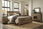Trinell King Panel Bed with Dresser, Chest and Nightstand in Brown from Ashley - Luna Furniture