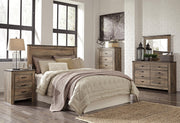 Trinell Queen Panel Headboard Bed with Mirrored Dresser and 2 Nightstands in Brown - PKG005073