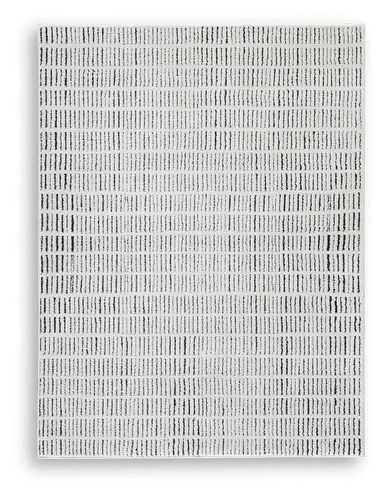 Turinwith Ivory/Black 5'3" x 7' Area Rug - R407552