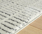 Turinwith Ivory/Black 5'3" x 7' Area Rug - R407552