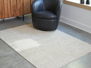 Wolbert Tan/Ivory 5' x 7' Area Rug - R407662