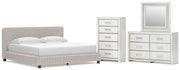 Zuraleus King Upholstered Bed, Dresser, Mirror and Chest in White - PKG022851