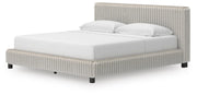 Zuraleus King Upholstered Bed, Dresser, Mirror and Nightstand in White - PKG022850