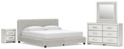 Zuraleus King Upholstered Bed, Dresser, Mirror and Nightstand in White - PKG022850