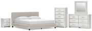 Zuraleus King Upholstered Bed, Dresser, Mirror, Chest and Nightstand in White - PKG022852