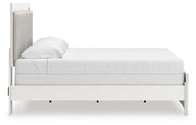 Zuraleus King Upholstered Panel Bed and Dresser in White - PKG022837