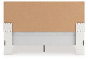 Zuraleus King Upholstered Panel Bed, Chest and  Nightstand in White - PKG022833