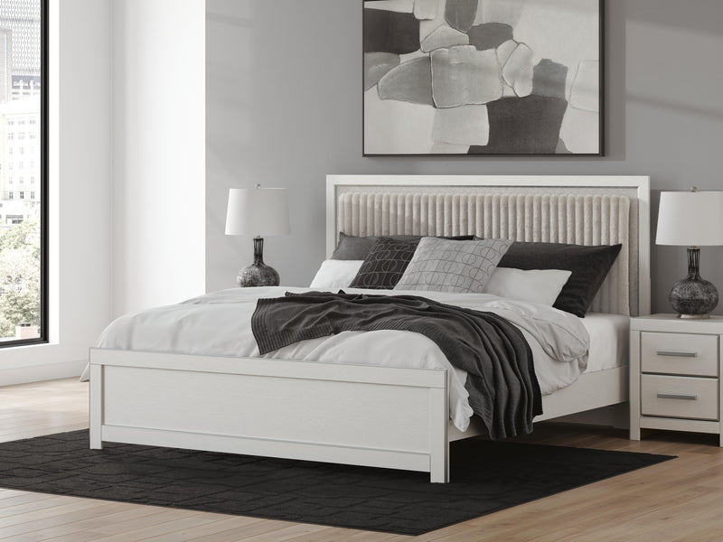 Zuraleus King Upholstered Panel Platform Bed, Chest and  Nightstand in White - PKG022817